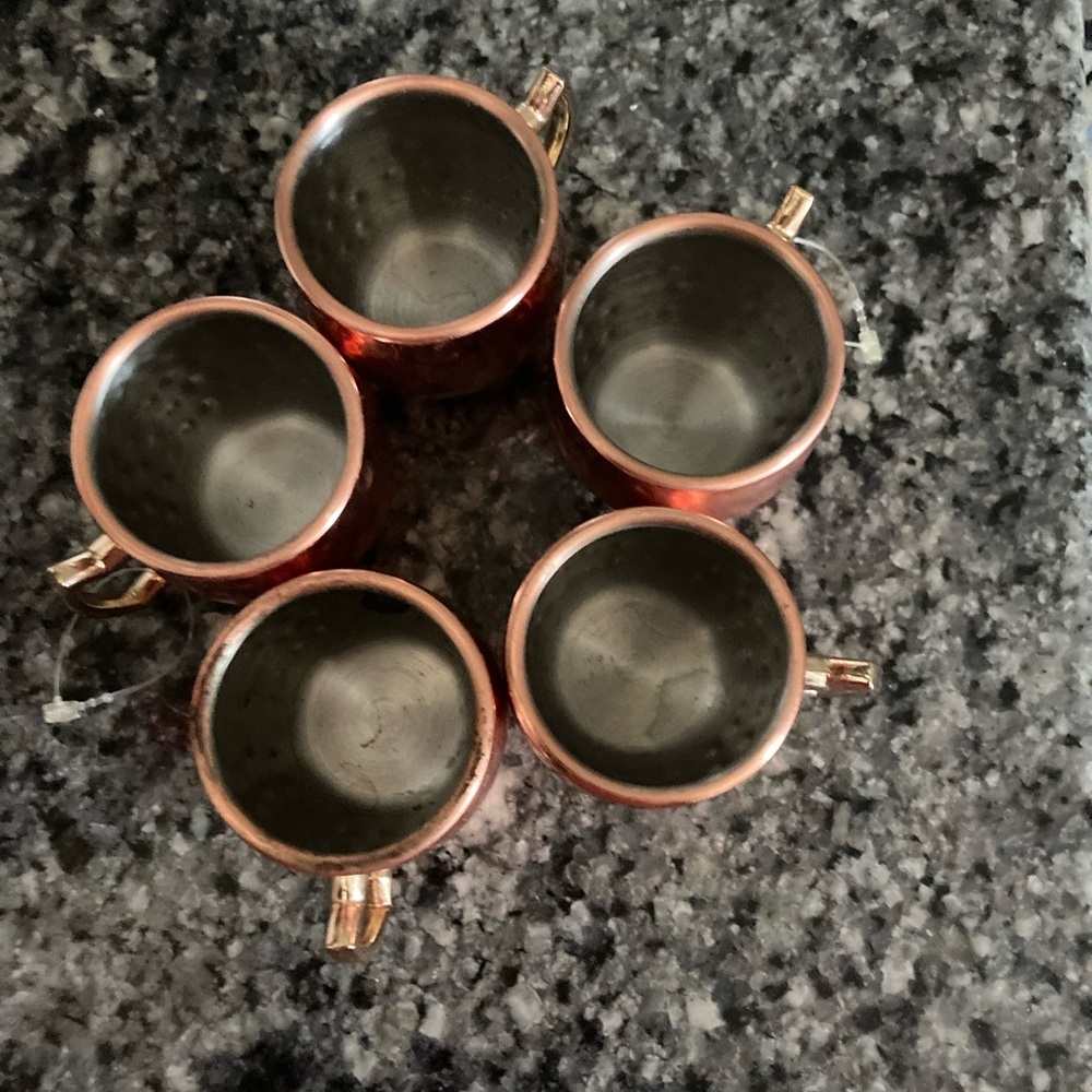 Small antique rose gold cups